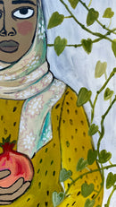 Noora with two pomegranates