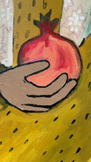 Noora with two pomegranates