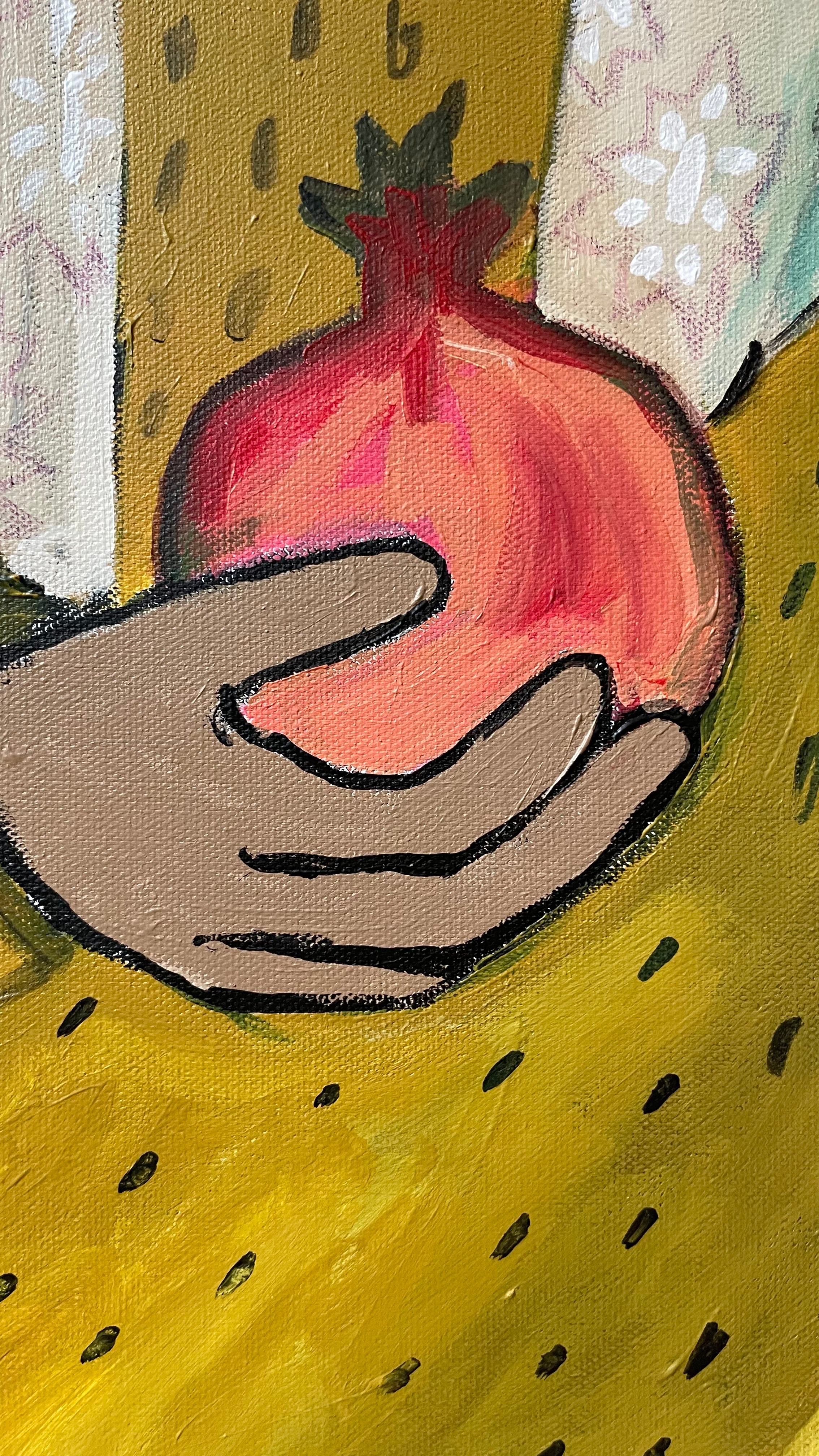 Noora with two pomegranates